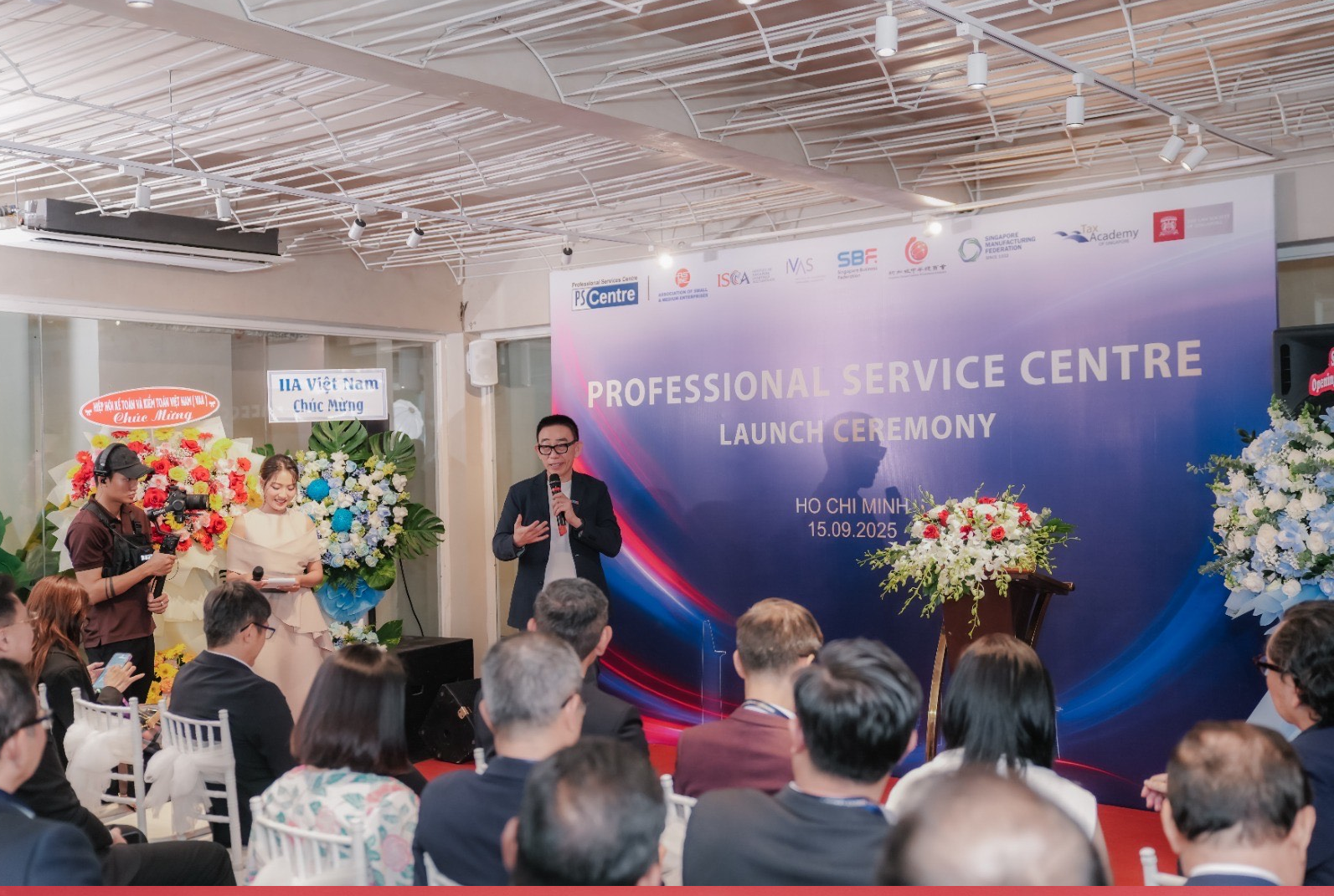 Mr Ernie Koh giving his welcome speech to mark this significant milestone and celebrate the occasion